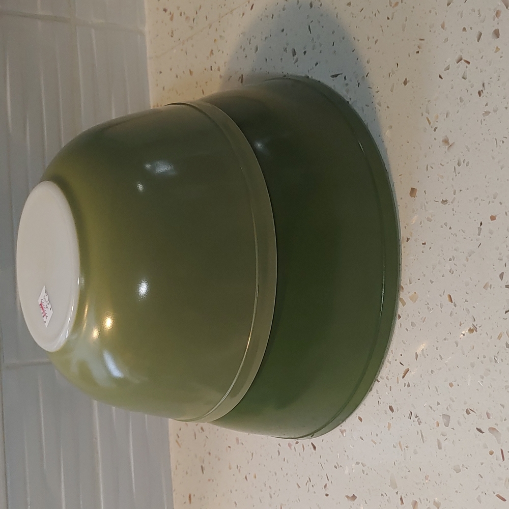 two large green pyrex bowls